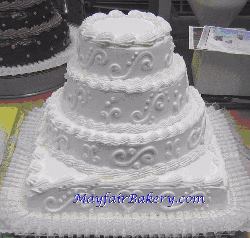 square cake with round tiers